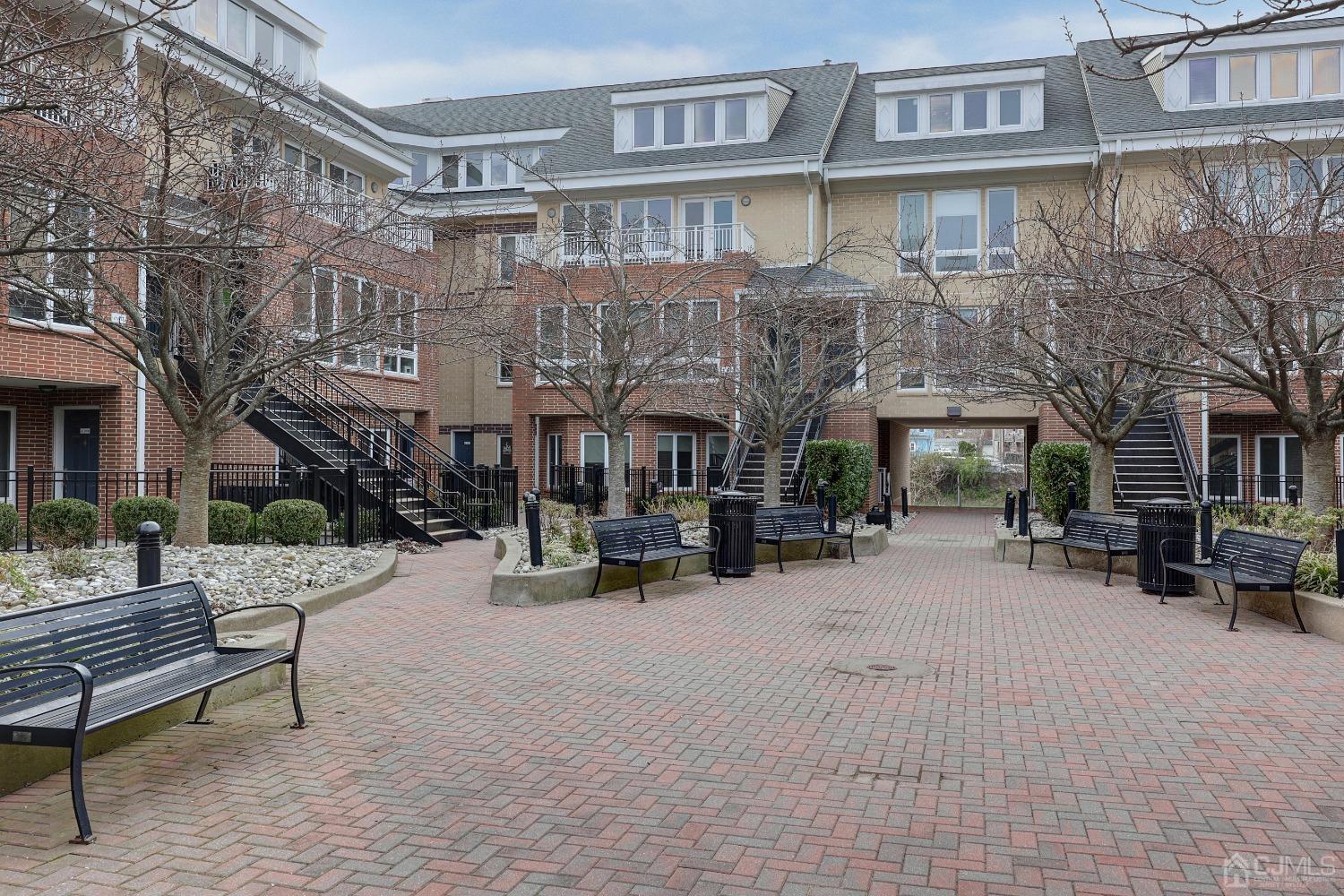 368 Rector Street, Unit 417 Perth Amboy, NJ 08861 - Photo 23 of 27 a view of building with with outdoor seating