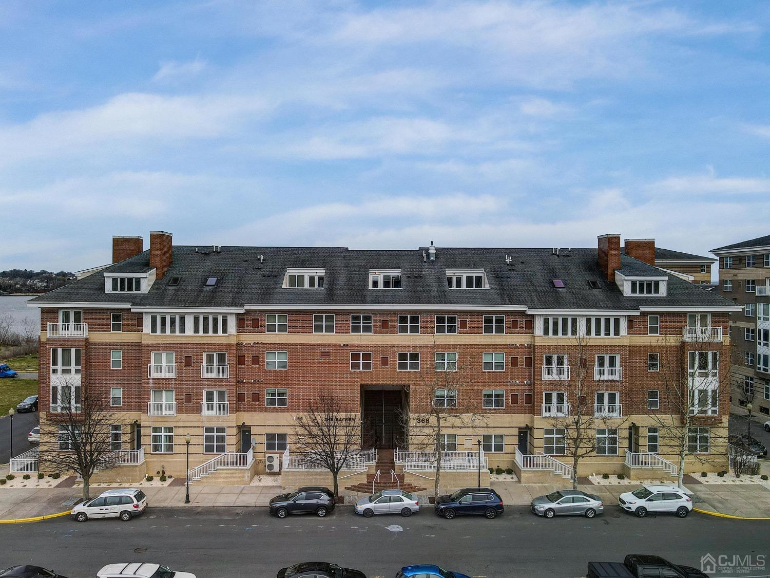 368 Rector Street, Unit 417 Perth Amboy, NJ 08861 - Photo 27 of 27 a front view of a building with street view