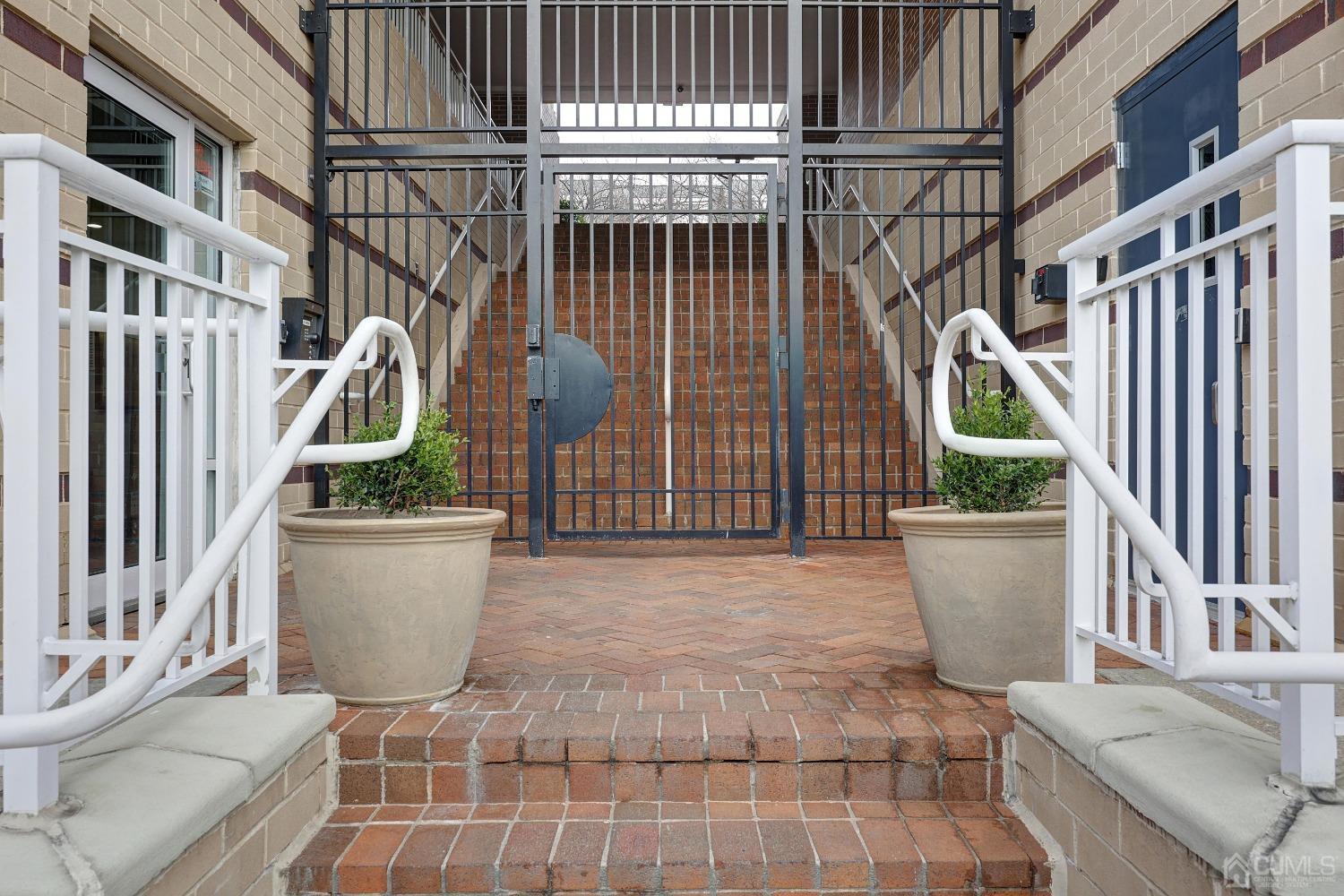 368 Rector Street, Unit 417 Perth Amboy, NJ 08861 - Photo 5 of 27 a view of a house with a patio
