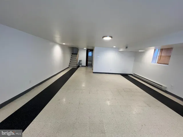 a view of a hall with a stove