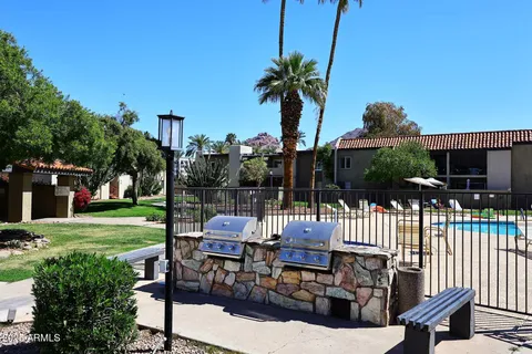 a garden view with a seating space