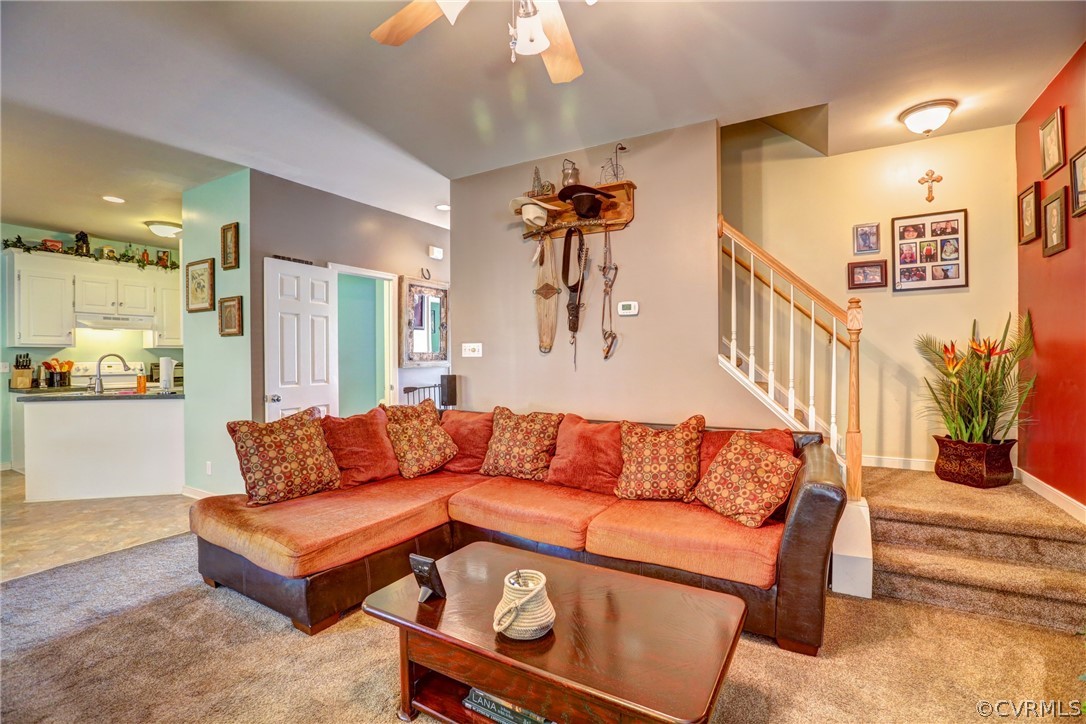 15855 Sandwave Road Chester, VA 23831 - Photo 18 of 42 a living room with furniture and a flat screen tv