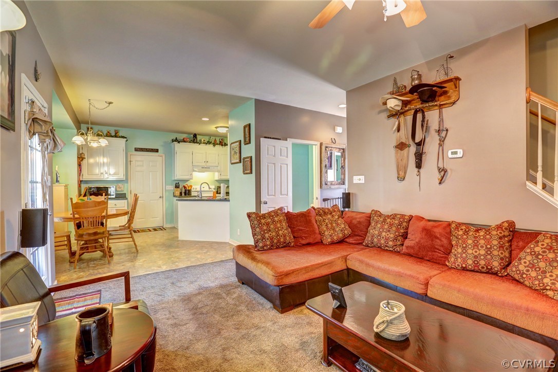 15855 Sandwave Road Chester, VA 23831 - Photo 19 of 42 a living room with furniture and a couch