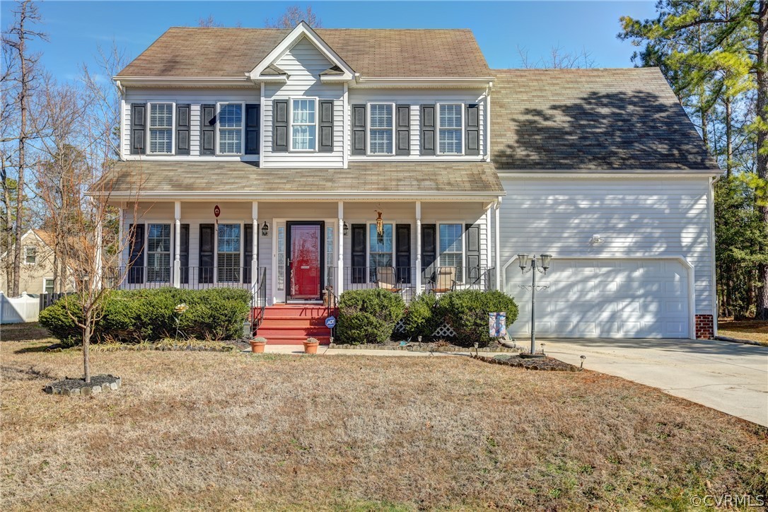 15855 Sandwave Road Chester, VA 23831 - Photo 2 of 42 front view of a brick house with a yard