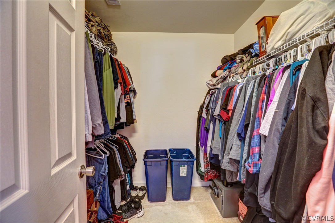 15855 Sandwave Road Chester, VA 23831 - Photo 27 of 42 a view of walk in closet with clothes