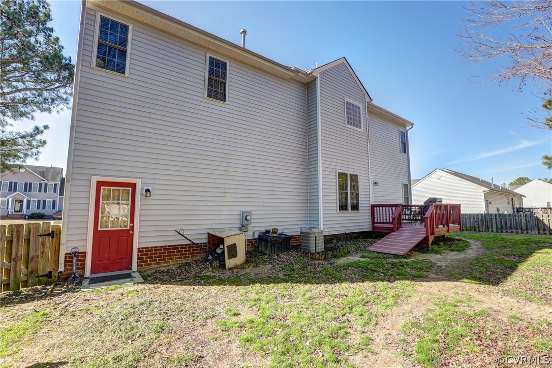 15855 Sandwave Road Chester, VA 23831 - Photo 36 of 42 a view of a house with backyard
