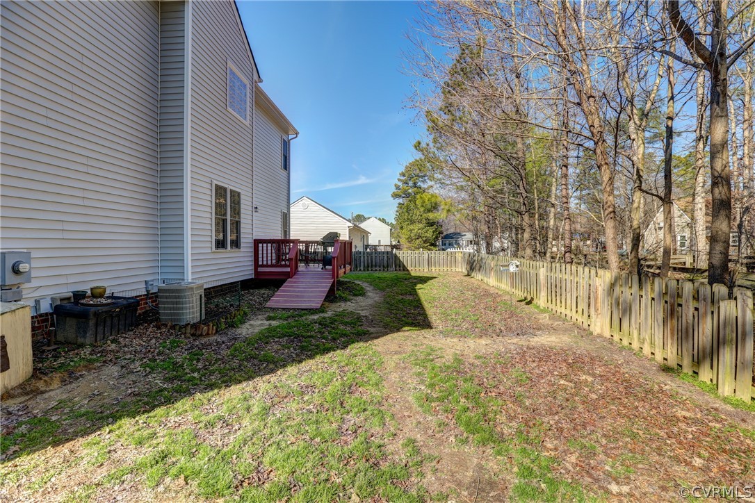 15855 Sandwave Road Chester, VA 23831 - Photo 37 of 42 a view of a backyard with sitting area