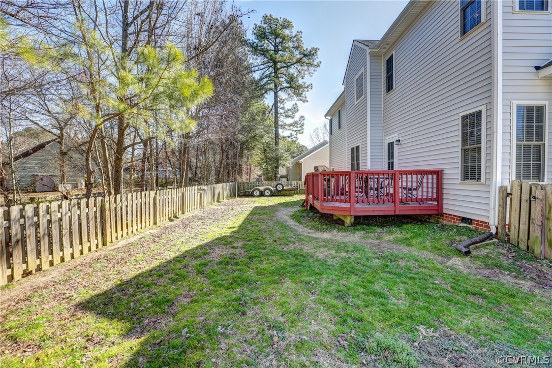 15855 Sandwave Road Chester, VA 23831 - Photo 39 of 42 a view of a house with a yard