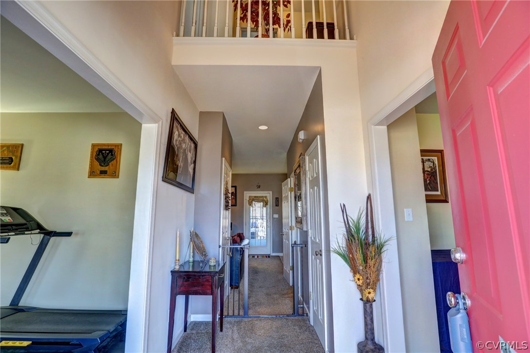 15855 Sandwave Road Chester, VA 23831 - Photo 4 of 42 a view of a hallway with furniture and entryway