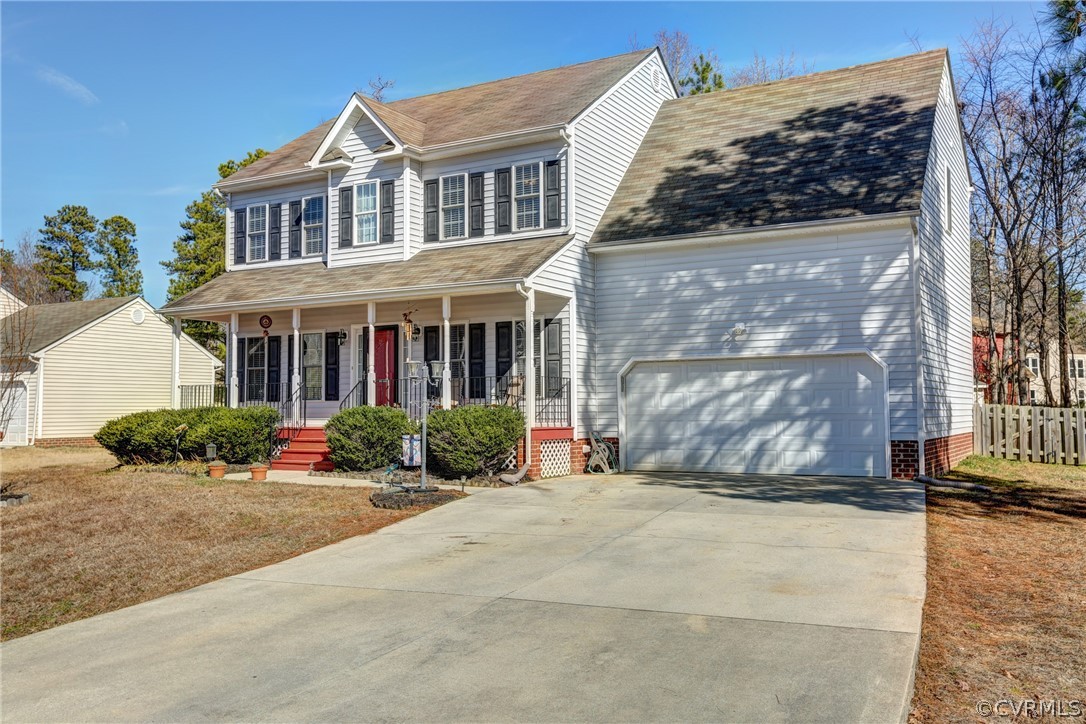 15855 Sandwave Road Chester, VA 23831 - Photo 42 of 42 a front view of a house with a yard