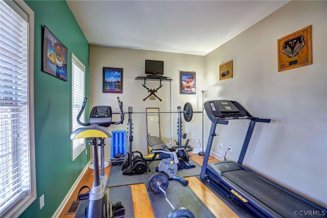 15855 Sandwave Road Chester, VA 23831 - Photo 6 of 42 a view of gym equipment with wooden floor