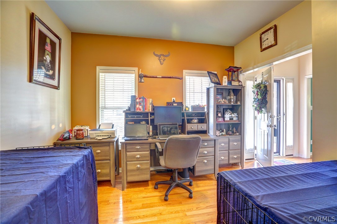 15855 Sandwave Road Chester, VA 23831 - Photo 8 of 42 a view of a workspace with furniture and a window