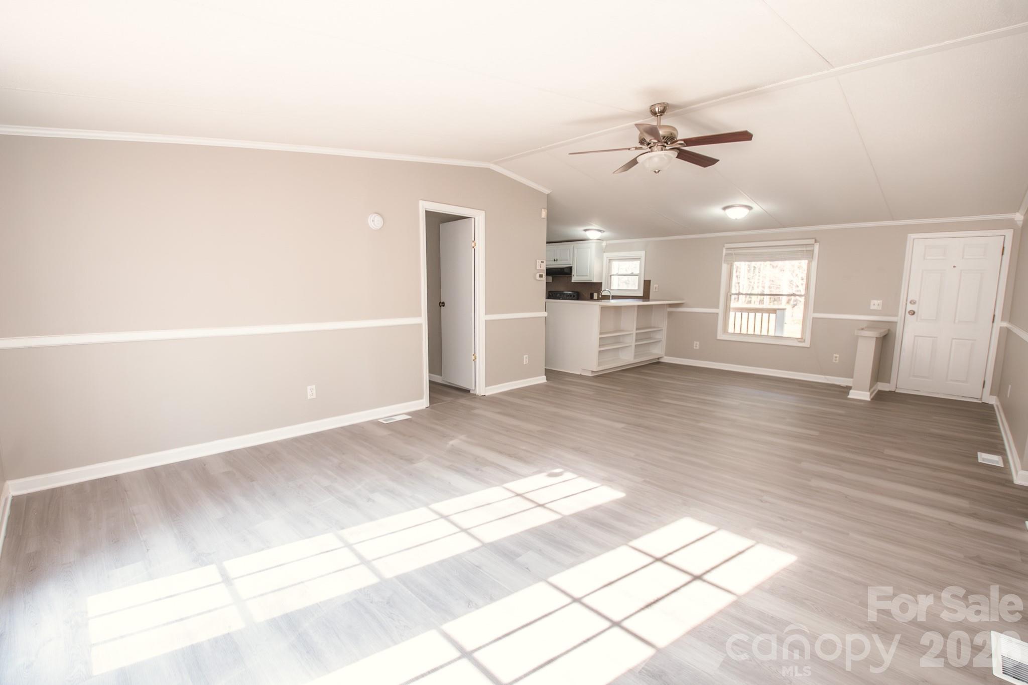44082 Harper Hearne Road New London, NC 28127 - Photo 12 of 38 a view of a kitchen with a sink and a window