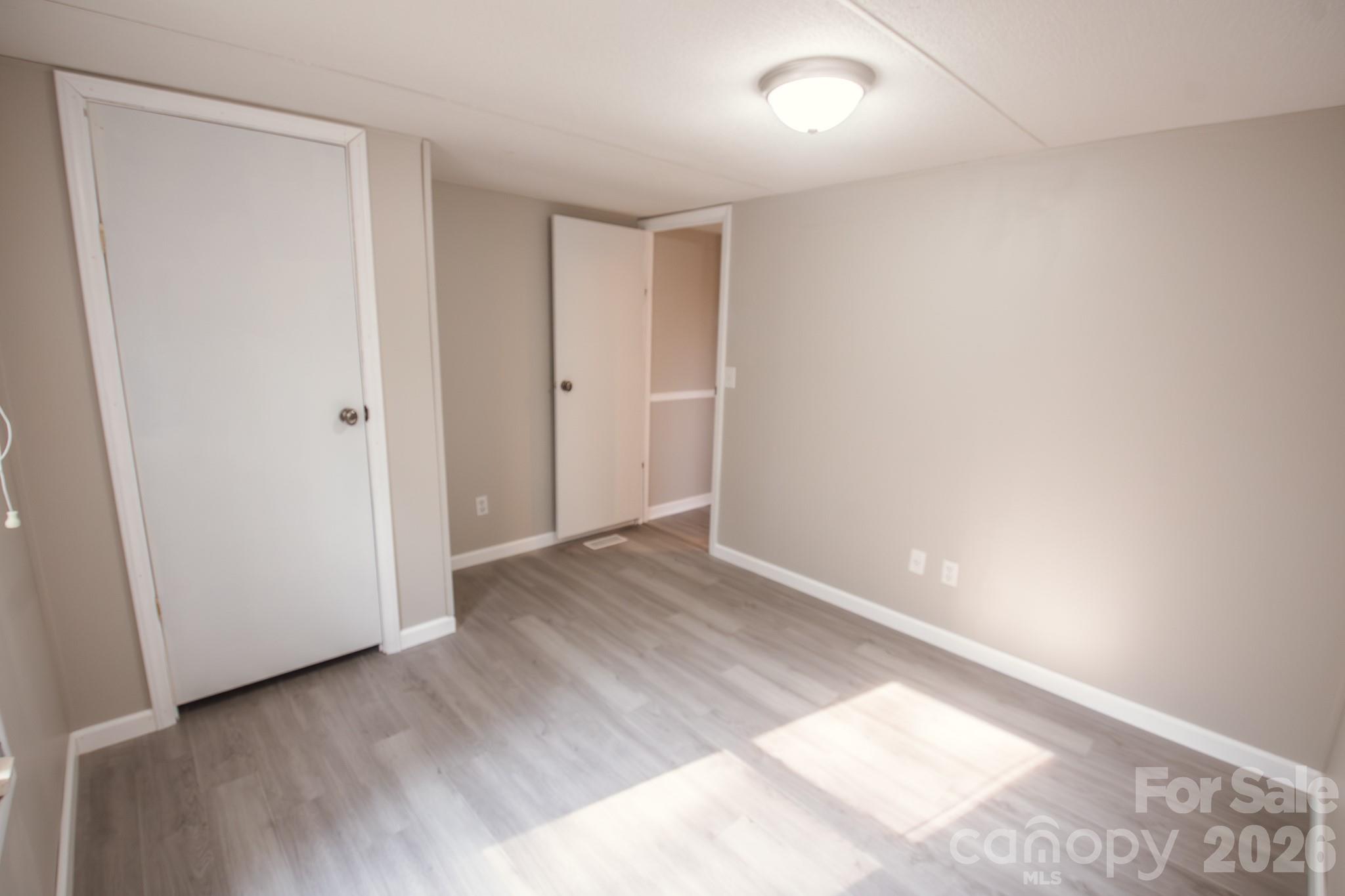 44082 Harper Hearne Road New London, NC 28127 - Photo 23 of 38 a view of an empty room