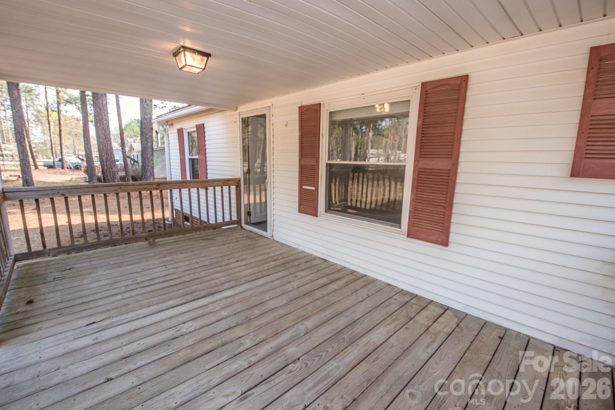 44082 Harper Hearne Road New London, NC 28127 - Photo 25 of 38 a view of a house with wooden floor