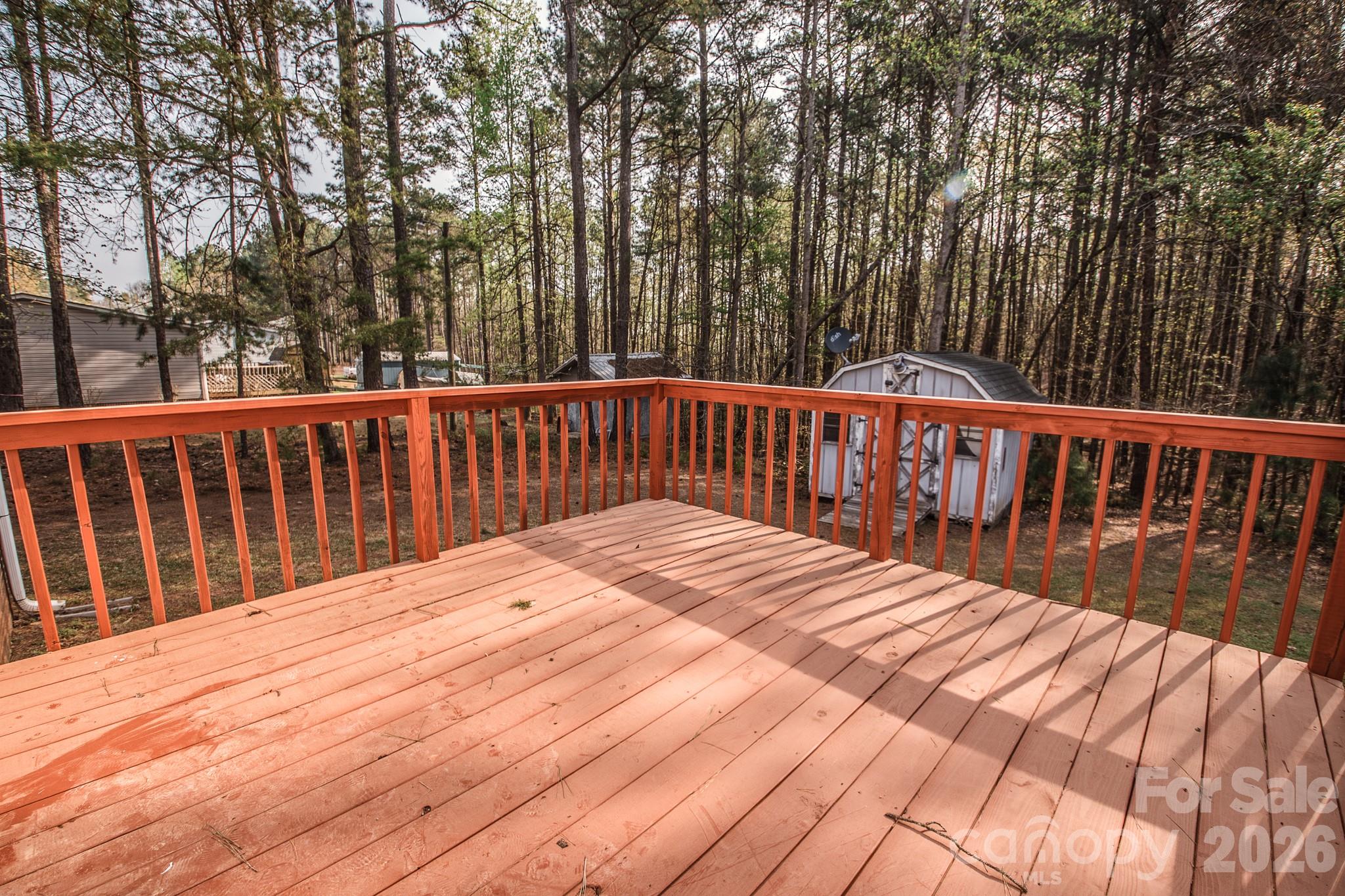 44082 Harper Hearne Road New London, NC 28127 - Photo 27 of 38 a view of wooden deck