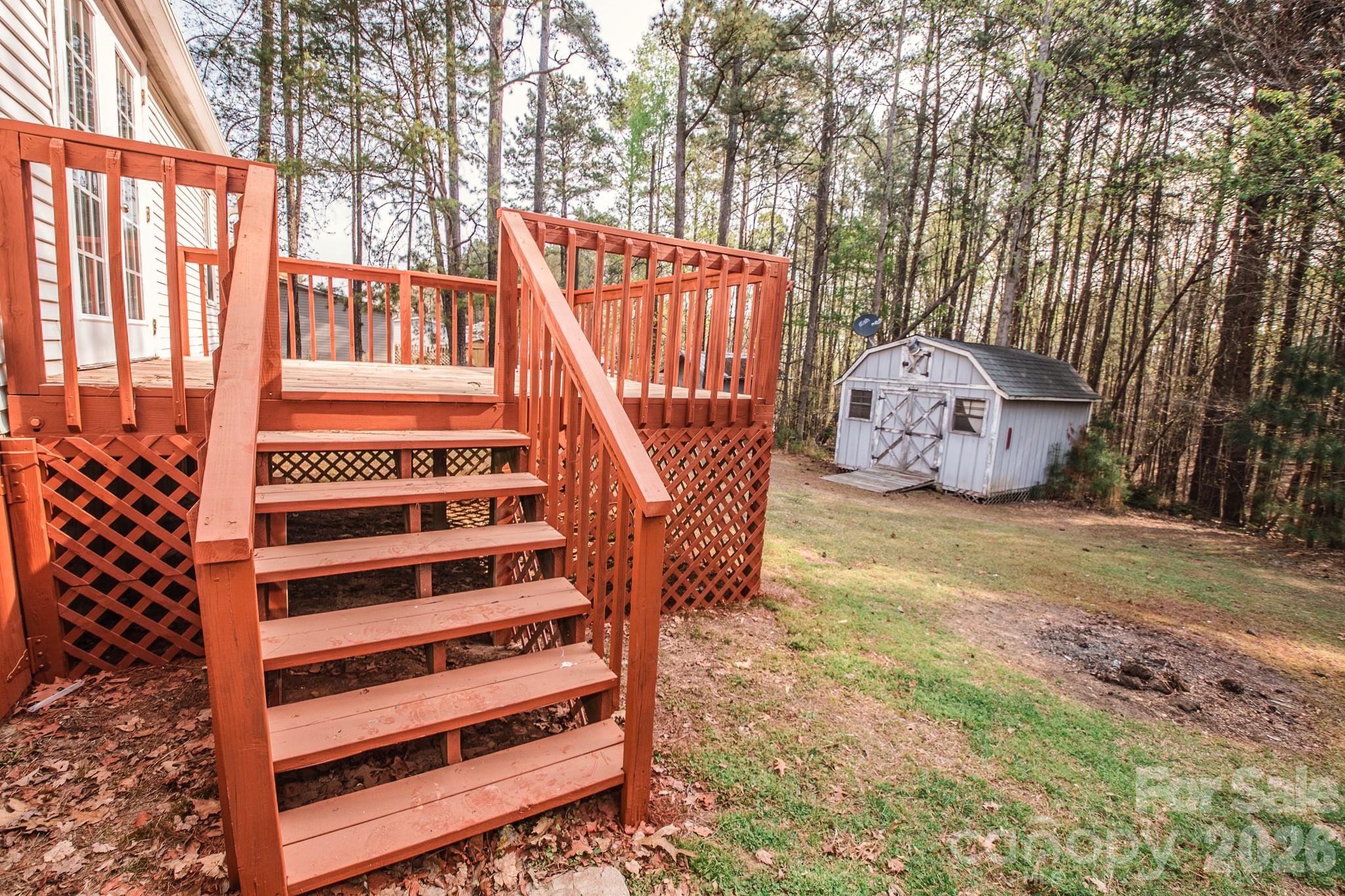 44082 Harper Hearne Road New London, NC 28127 - Photo 29 of 38 a view of a backyard of a house