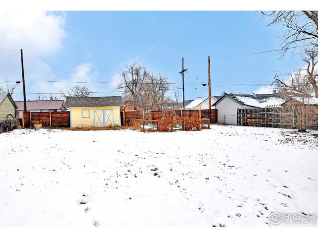 a view of a car park in front of house