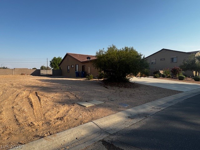 3744 River Heights Lane Logandale, NV 89021 - Photo 14 of 17 A spacious desert lot offers prime development potential with nearby established homes.