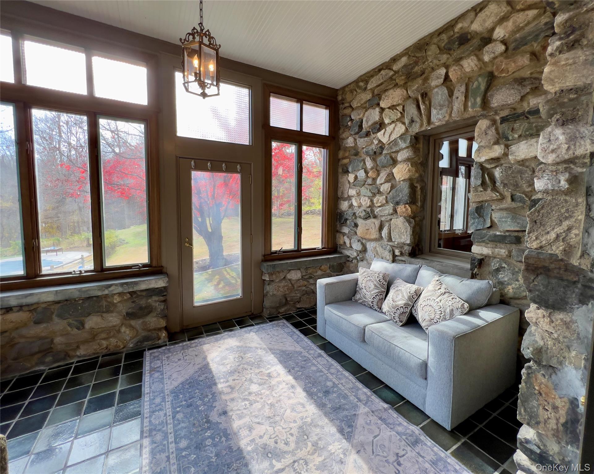 85 Washington Road Carmel, NY 10512 - Photo 5 of 30 a living room with furniture and a large window