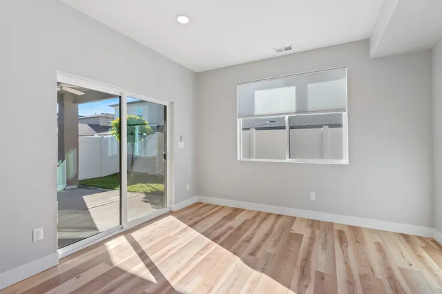 a room that has a bed and a window