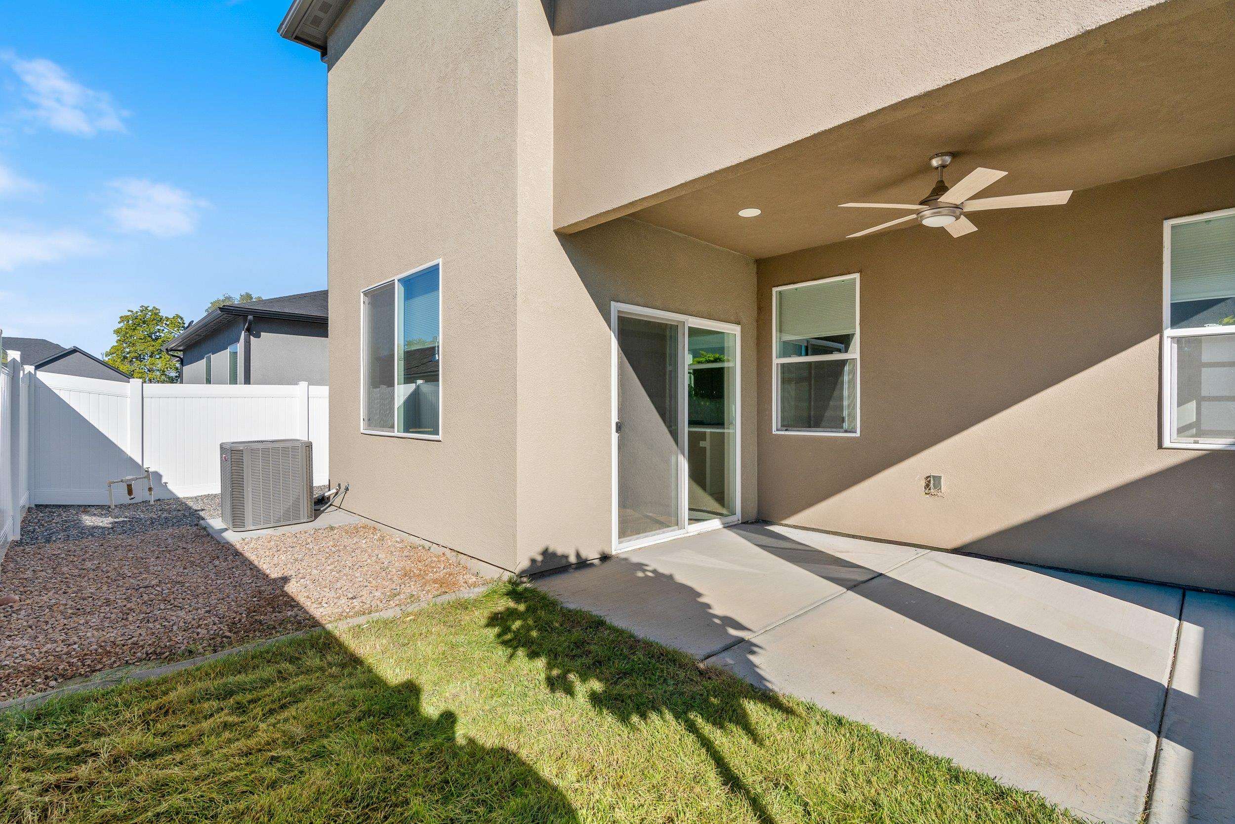 2453 Ross Road, Unit A Grand Junction, CO 81505 - Photo 24 of 27 a front view of a house with a yard