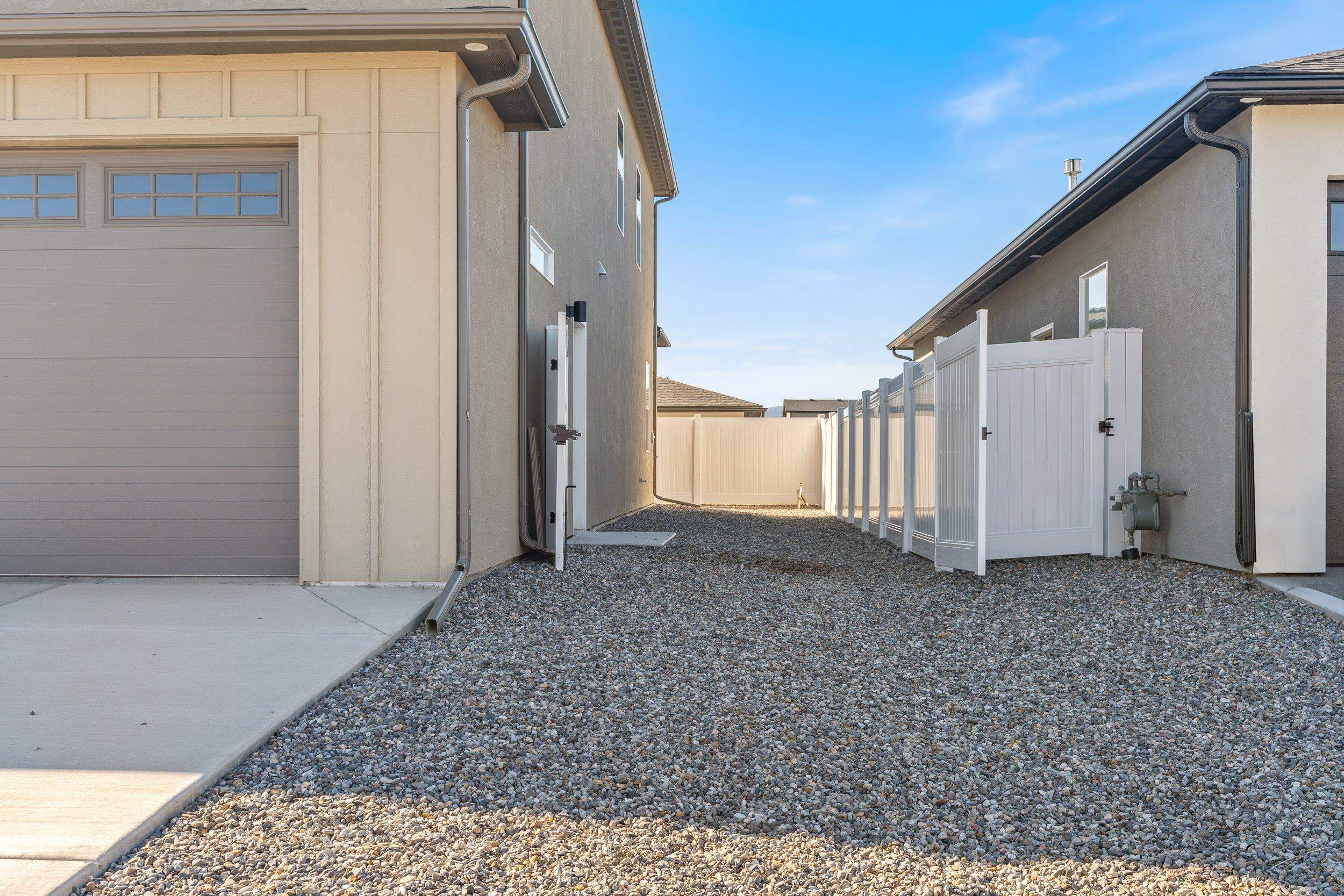 2453 Ross Road, Unit A Grand Junction, CO 81505 - Photo 26 of 27 a view of a house with a backyard