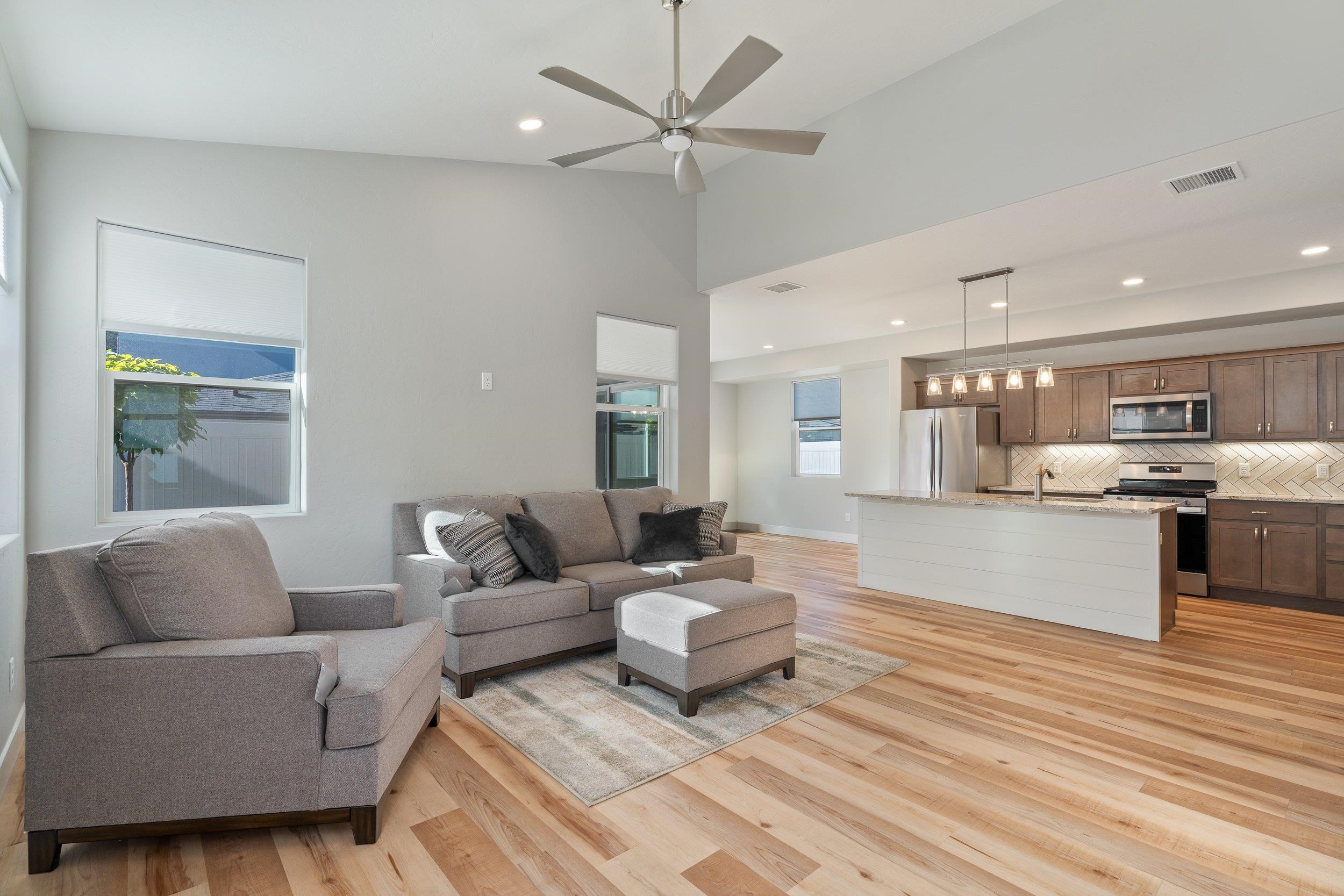 2453 Ross Road, Unit A Grand Junction, CO 81505 - Photo 3 of 27 a living room with furniture and kitchen view