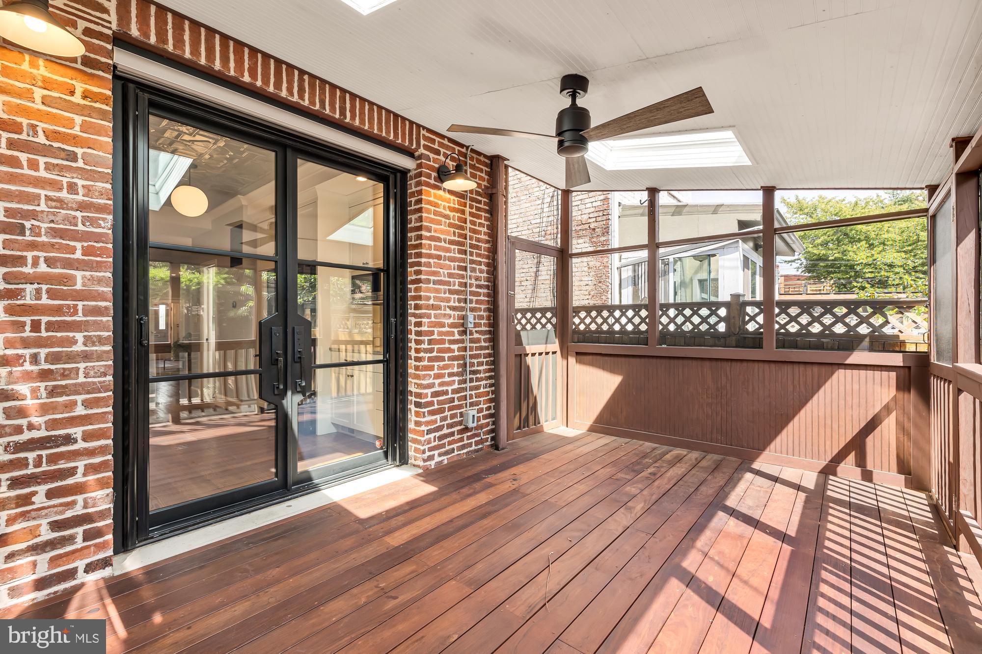 415 10th Street Northeast Washington, DC 20002 - Photo 19 of 51 Custom iron door leads to screened in porch