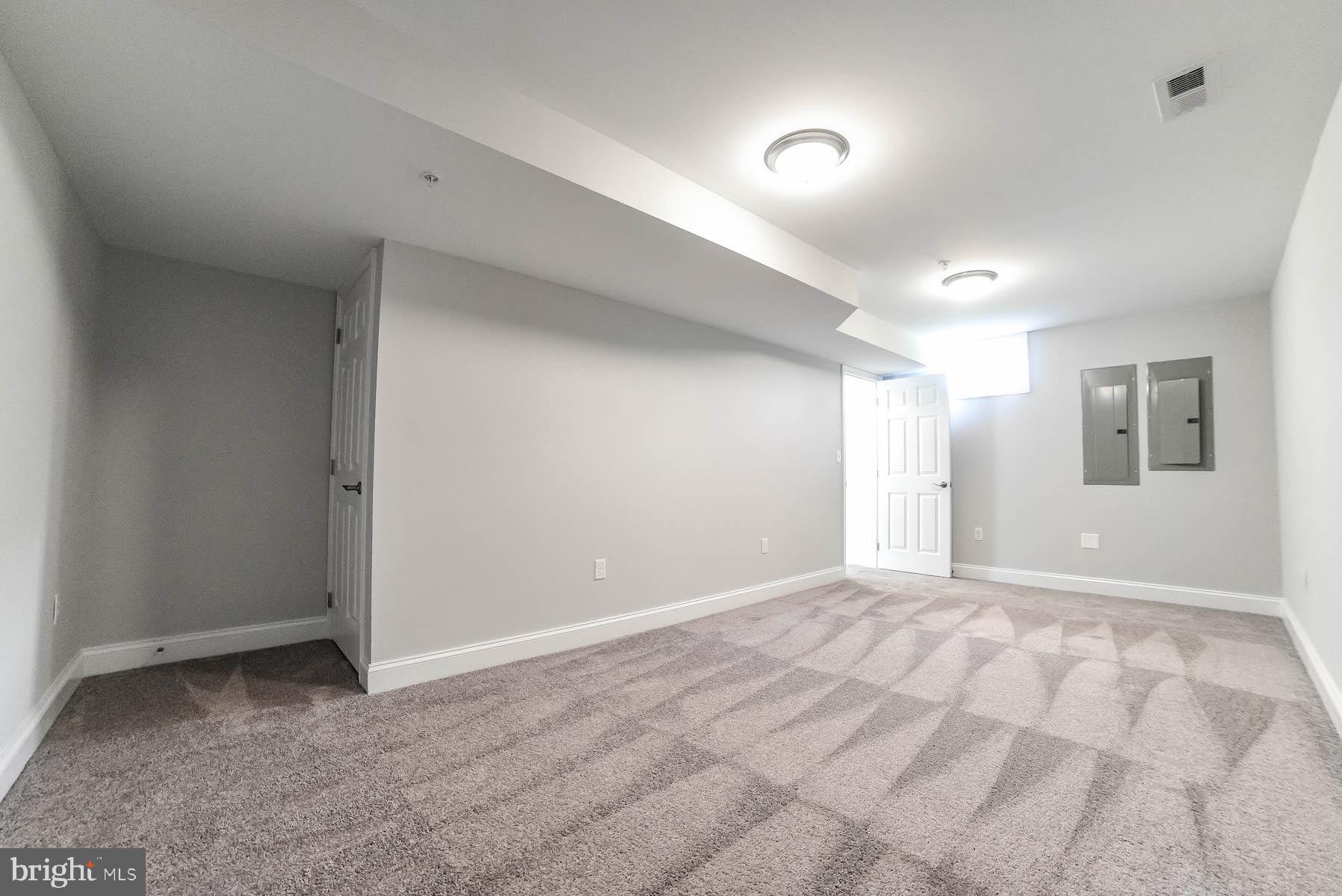 1155 Cove Point Road Lusby, MD 20657 - Photo 48 of 50 Basement Theater Room