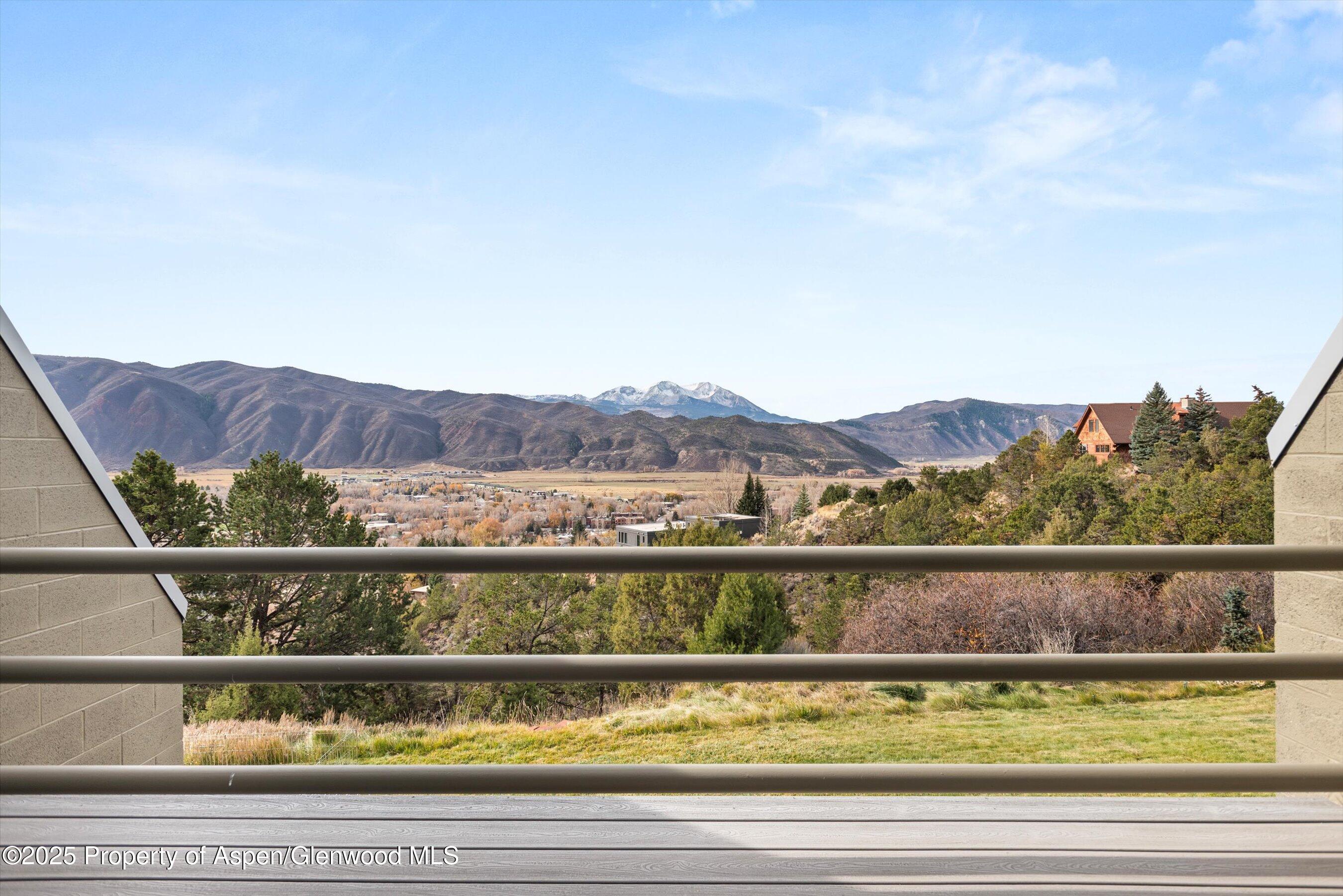 805 Pinon Drive, Unit 4 Basalt, CO 81621 - Photo 13 of 20 a view of a lake with a mountain