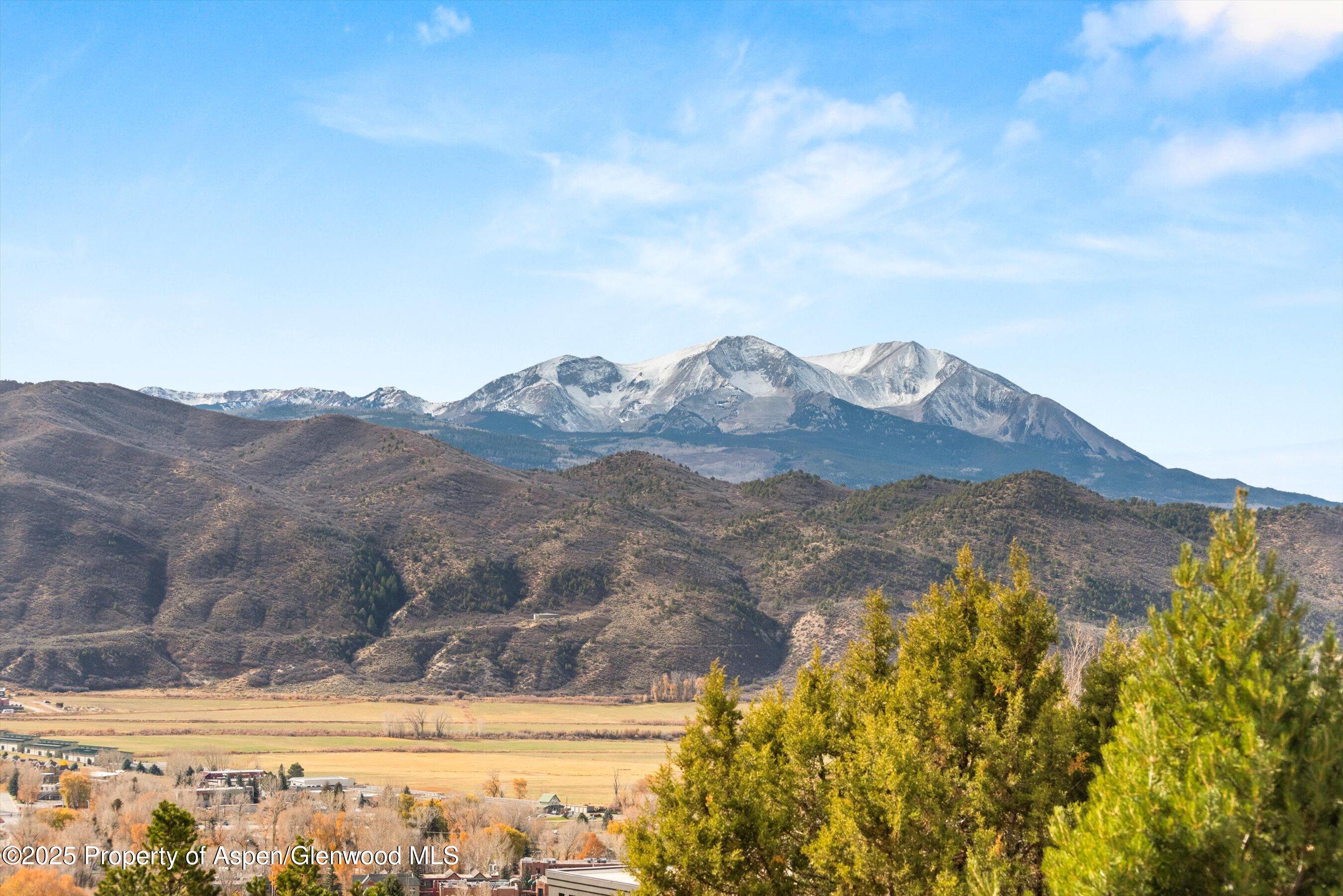 805 Pinon Drive, Unit 4 Basalt, CO 81621 - Photo 5 of 20 a view of mountain with sunset in background