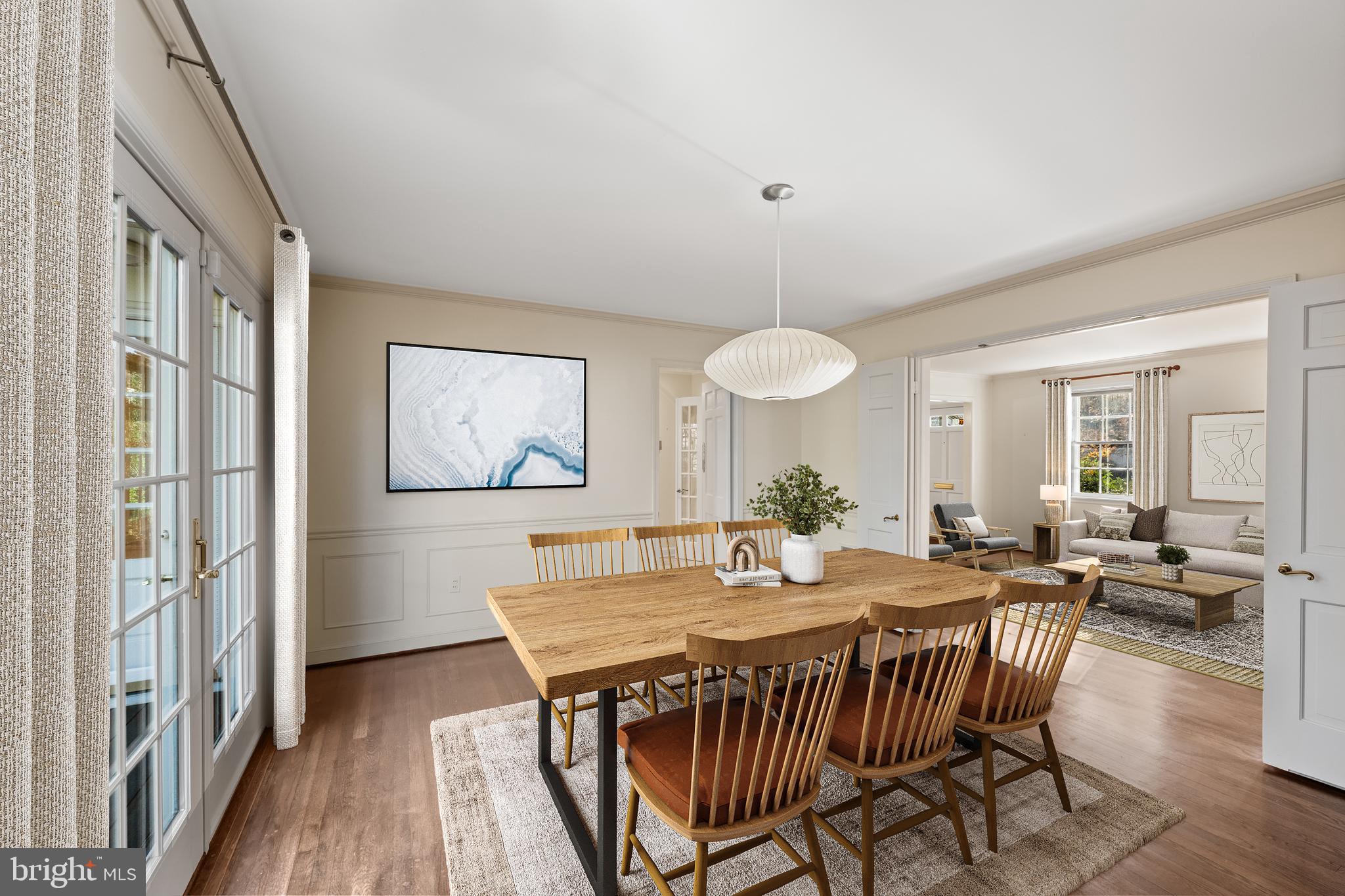 4238 50th Street Northwest Washington, DC 20016 - Photo 13 of 55 a view of a dining room with furniture window and wooden floor