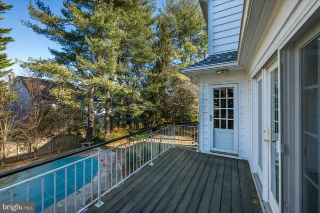 a view of balcony with wooden floor