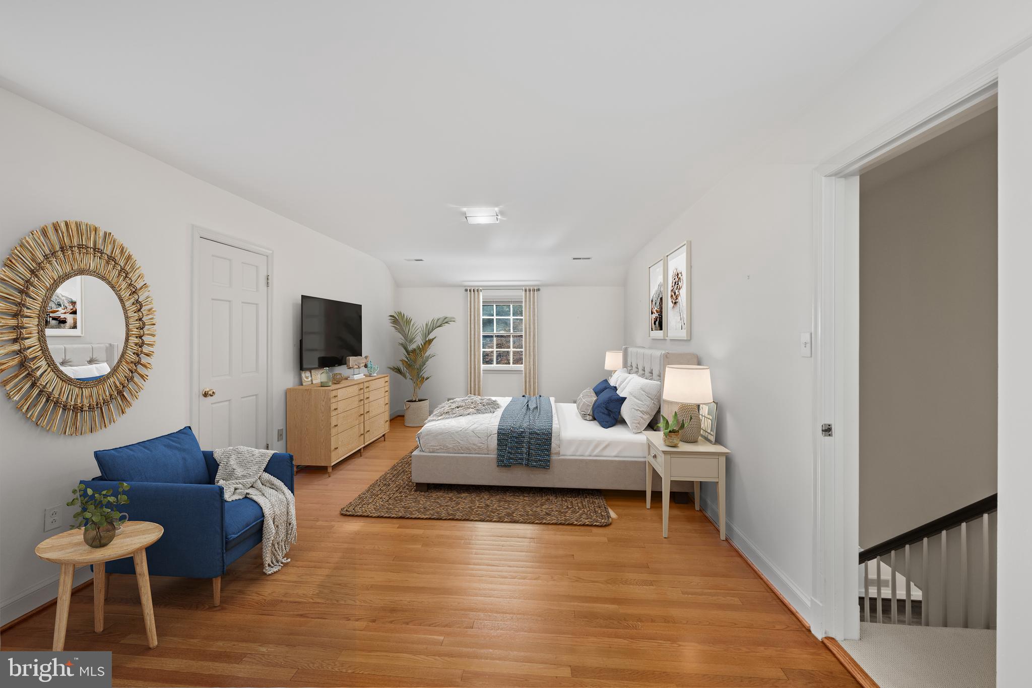 4238 50th Street Northwest Washington, DC 20016 - Photo 30 of 55 a living room with furniture and a flat screen tv