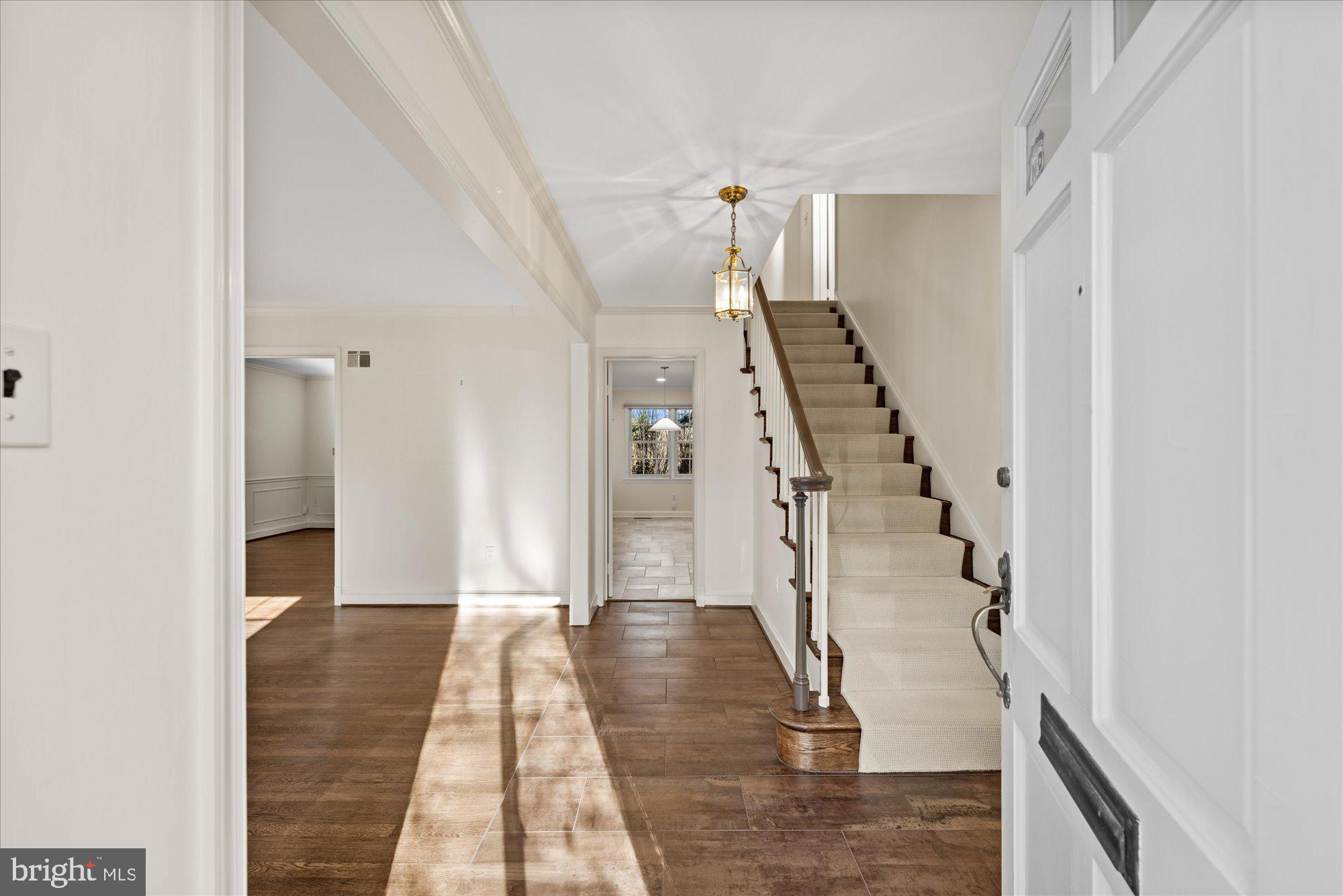4238 50th Street Northwest Washington, DC 20016 - Photo 3 of 55 a view of entryway and hall with wooden floor