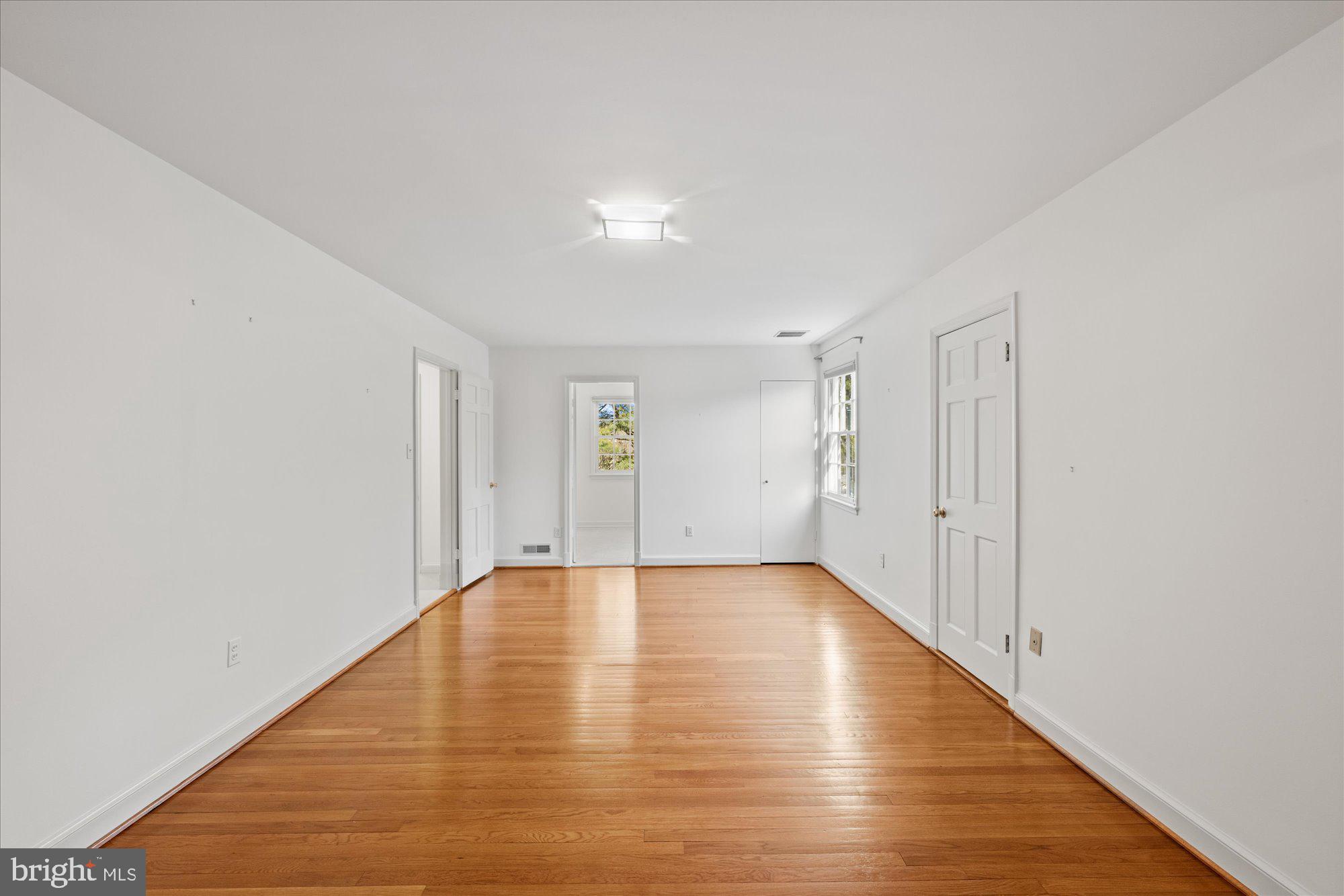 4238 50th Street Northwest Washington, DC 20016 - Photo 33 of 55 Primary bedroom, two closets, including a walk-in