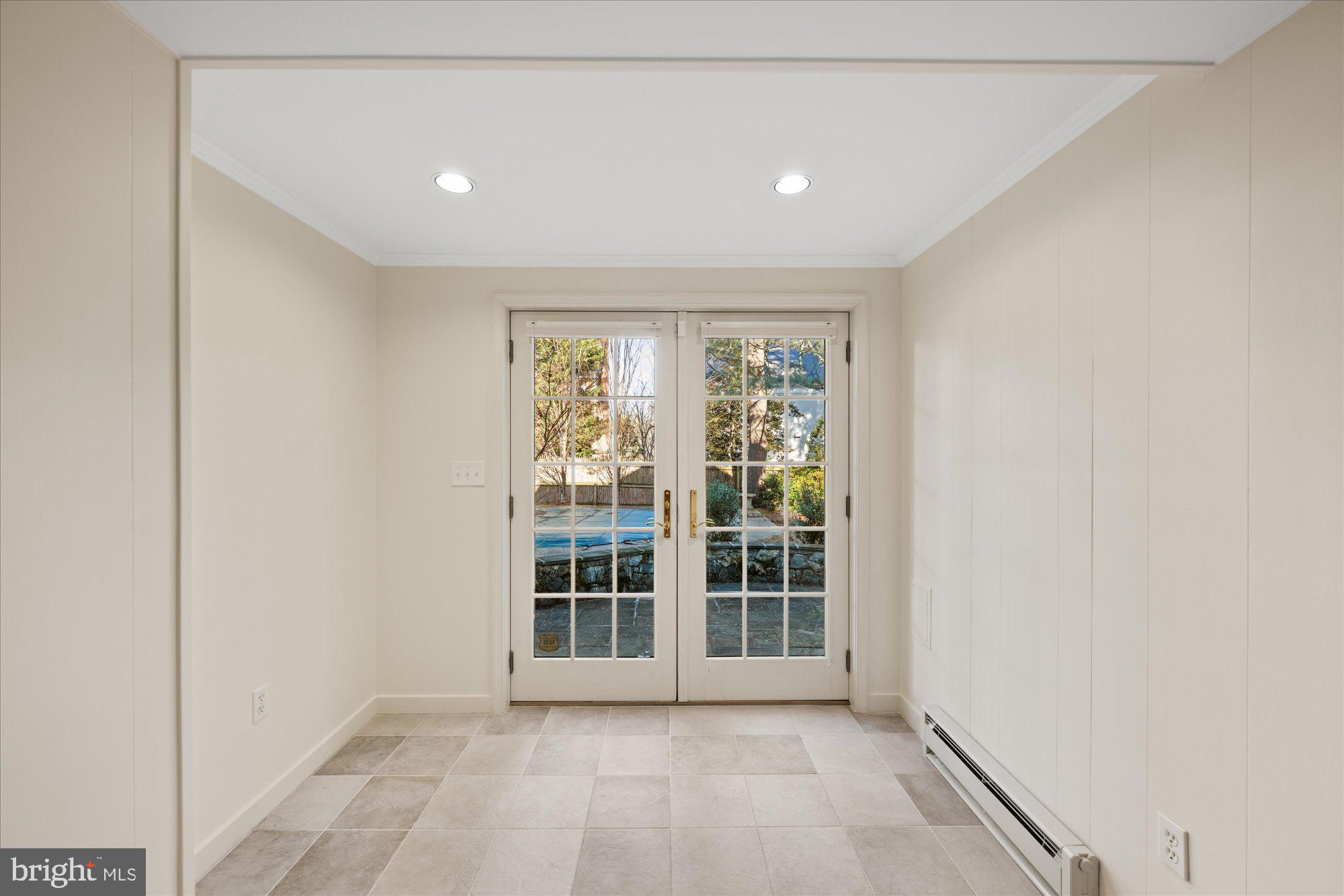 4238 50th Street Northwest Washington, DC 20016 - Photo 45 of 55 a view of empty room with wooden floor and fan