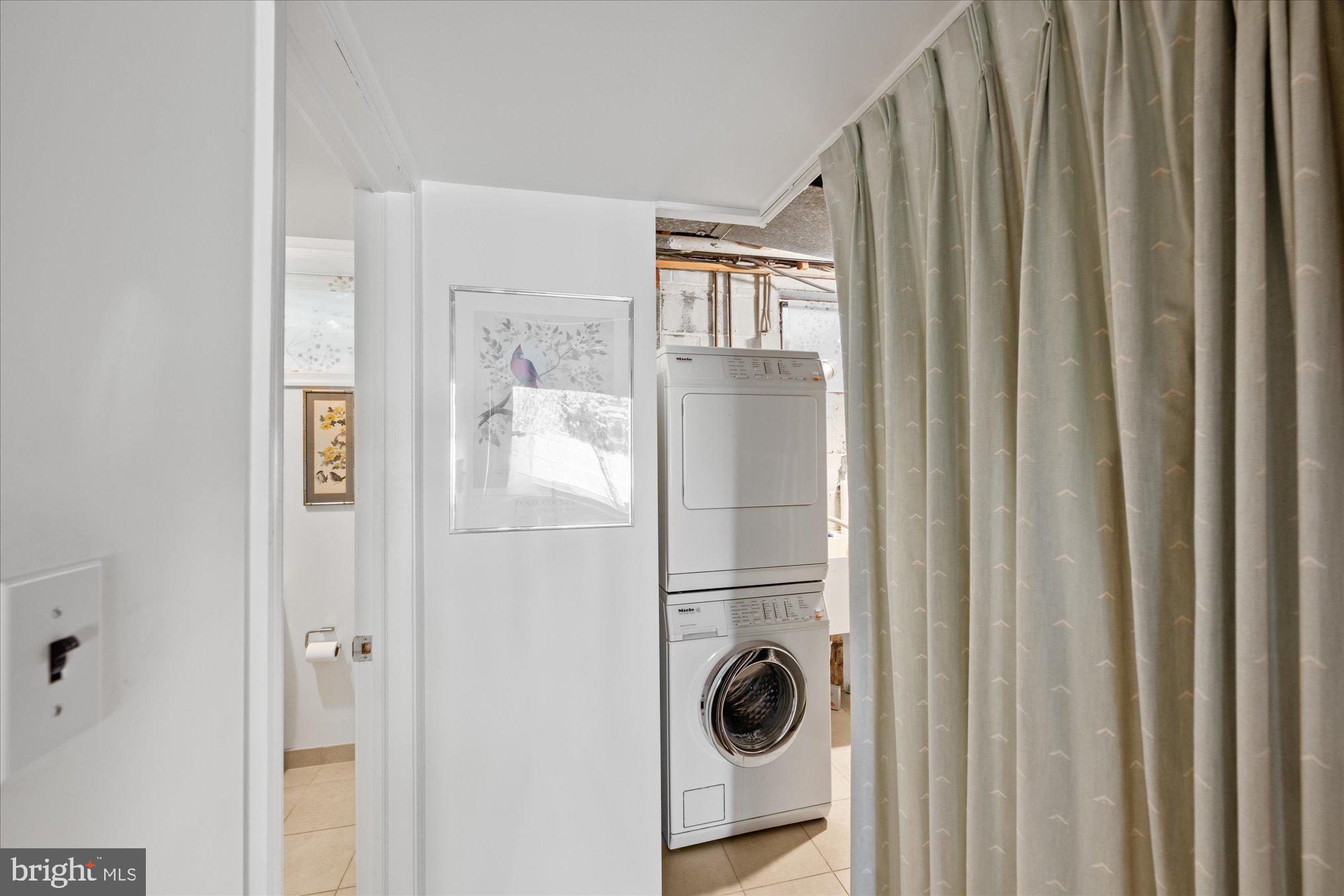 4238 50th Street Northwest Washington, DC 20016 - Photo 47 of 55 a utility room with dryer and washer