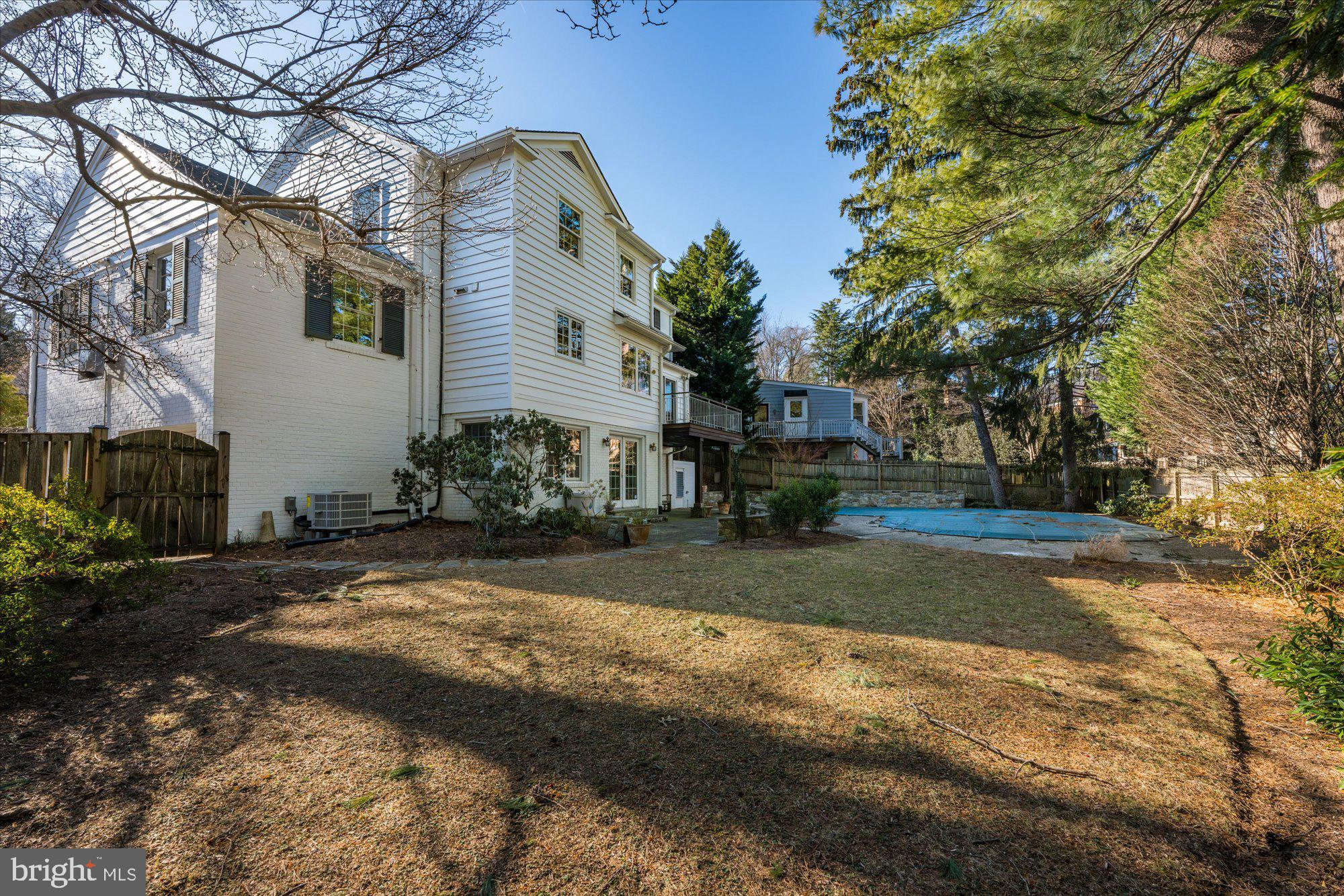 4238 50th Street Northwest Washington, DC 20016 - Photo 51 of 55 a view of a house with a yard