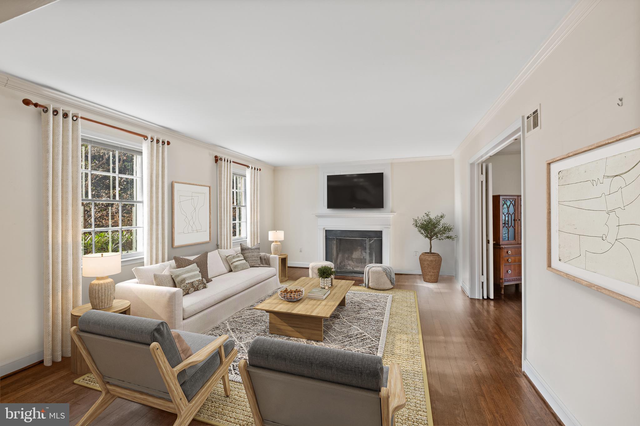 4238 50th Street Northwest Washington, DC 20016 - Photo 6 of 55 a living room with furniture and a fireplace