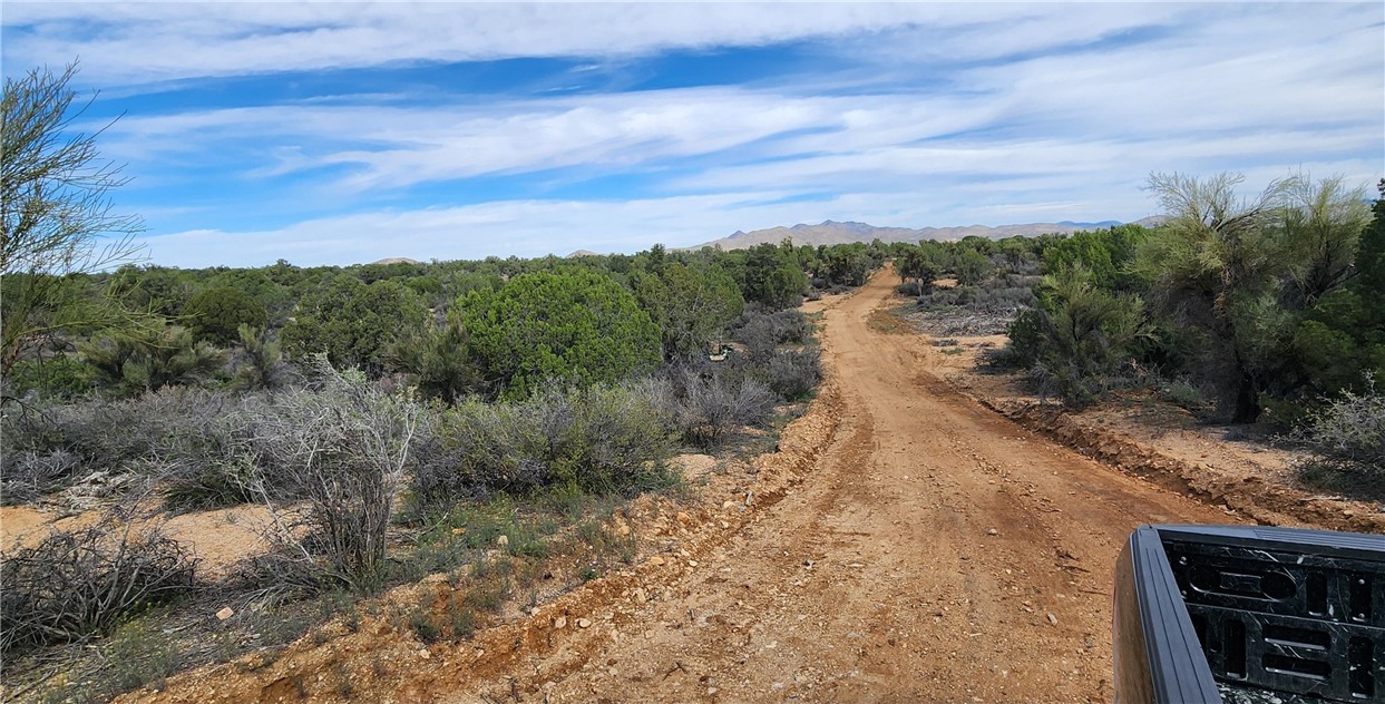 10116 East Hidden Valley Road Kingman, AZ 86401 - Photo 13 of 58 a view of a pathway with a yard