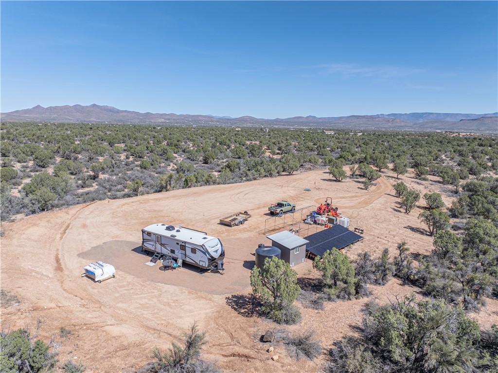 10116 East Hidden Valley Road Kingman, AZ 86401 - Photo 25 of 58 an aerial view of a house with a mountain