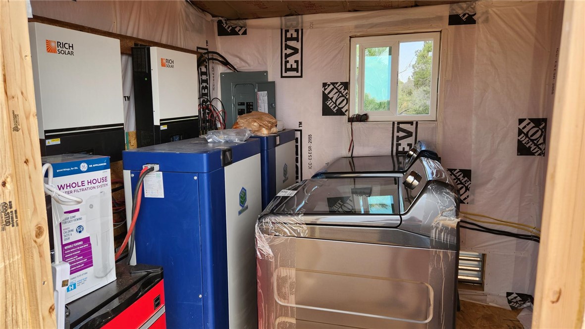 10116 East Hidden Valley Road Kingman, AZ 86401 - Photo 57 of 58 a utility room with dryer and washer