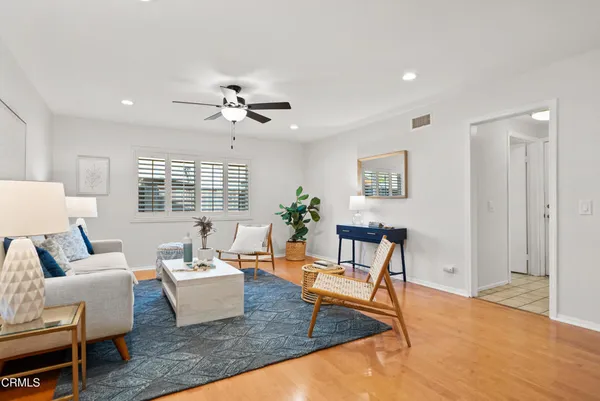 a living room with furniture or couch and a window