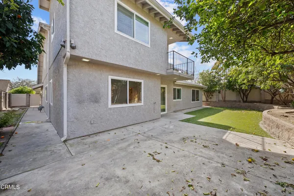 a view of backyard with green space