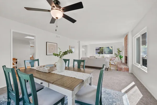 a view of a dining room with furniture
