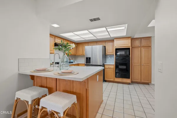a kitchen with a sink cabinets and counter space