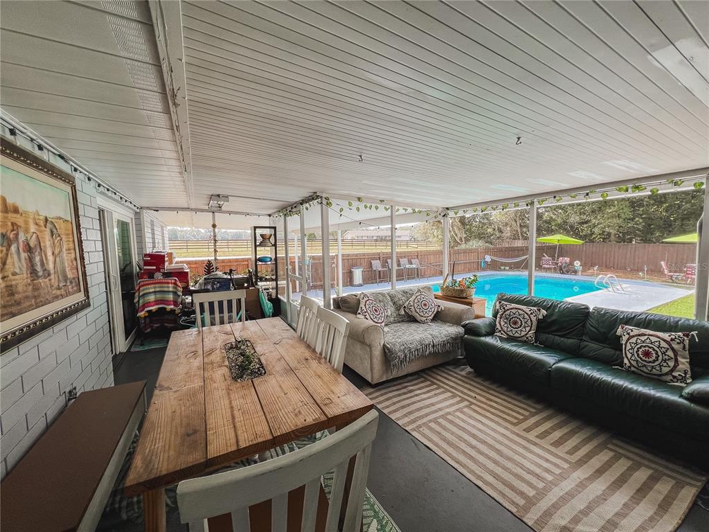 1810 Anchor Avenue DeLand, FL 32720 - Photo 23 of 29 a living room with furniture and a large window