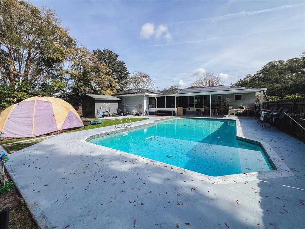 1810 Anchor Avenue DeLand, FL 32720 - Photo 24 of 29 a view of a house with a swimming pool